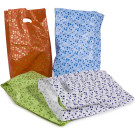 Sacchetti in plastica colorata con manico a fagiolo (KG)