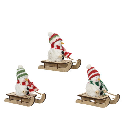 Pupazzo di neve con slitta